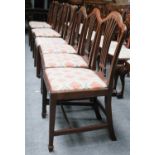 Eight Georgian Mahogany Dining Chairs, of similar design, with pierced splats and drop in seats,