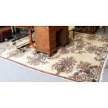 A Khorasan Carpet, the ivory field with semi-naturalistic floral sprays centred by a medallion and