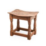 Robert Mouseman Thompson (1876-1955): A Burr Oak Dish Top Stool, with nailed top, on four