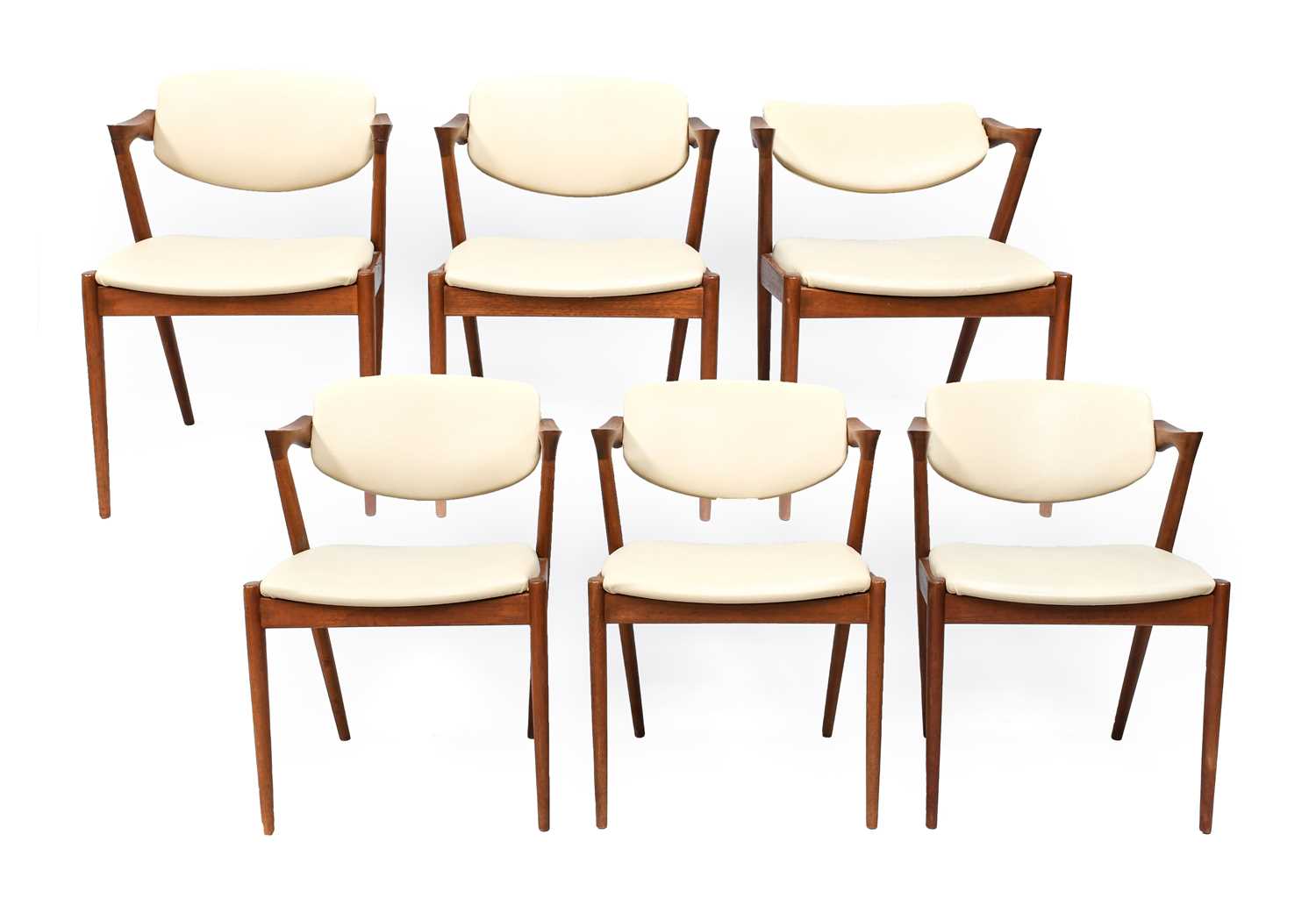 A Set of Six 1960s Danish Teak Model 42 Armchairs, designed by Kai Kristiansen, the frames with