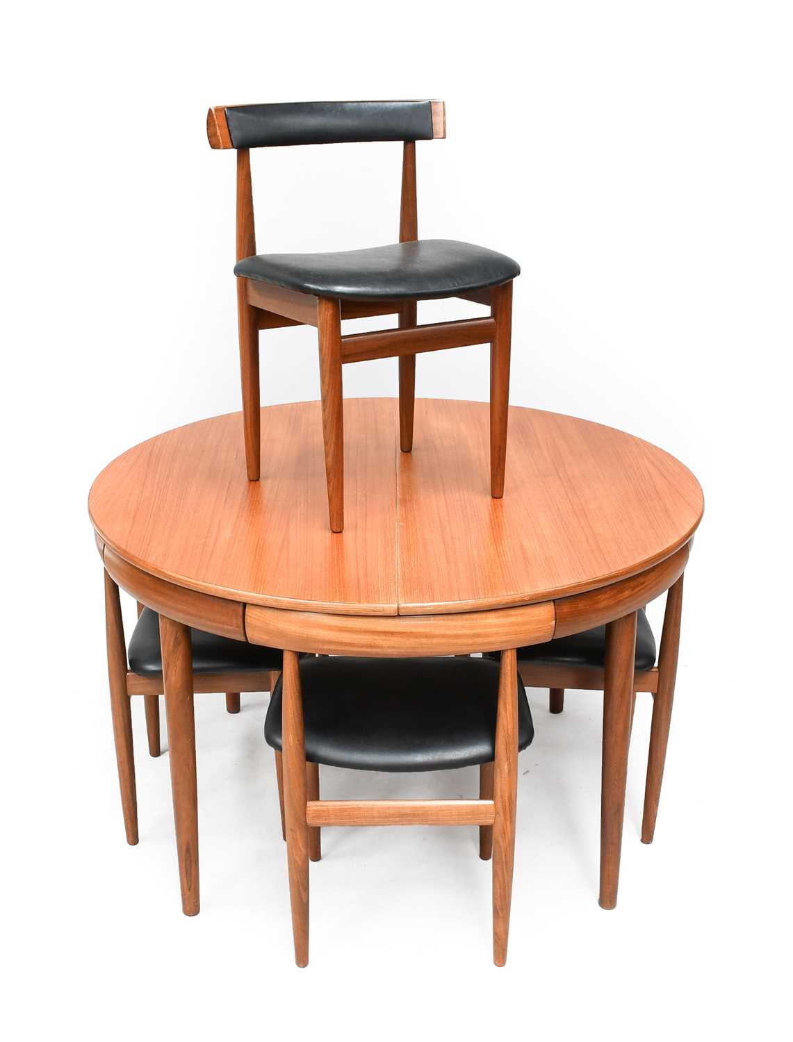 Hans Olsen for Frem Rojle: A 1960s Teak Dining Room Suite, Extending Circular Dining Table, on