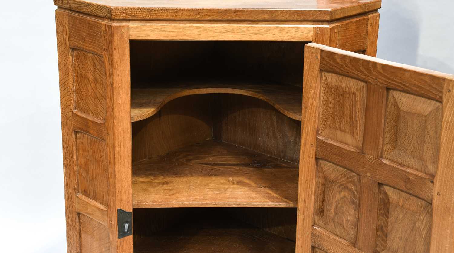 Squirrelman: Wilfrid Hutchinson (Husthwaite): A Panelled Oak Hanging Corner Cupboard, with wrought - Image 2 of 2