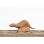 Workshop of Robert Mouseman Thompson (Kilburn): A Carved English Oak Otter, on all fours and
