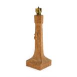 Workshop of Robert Mouseman Thompson (Kilburn): An English Oak Table Lamp, octagonal column on a