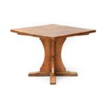 Robert Mouseman Thompson (1876-1955): An English Oak Dowelled Top Table, on a cruciform base, with