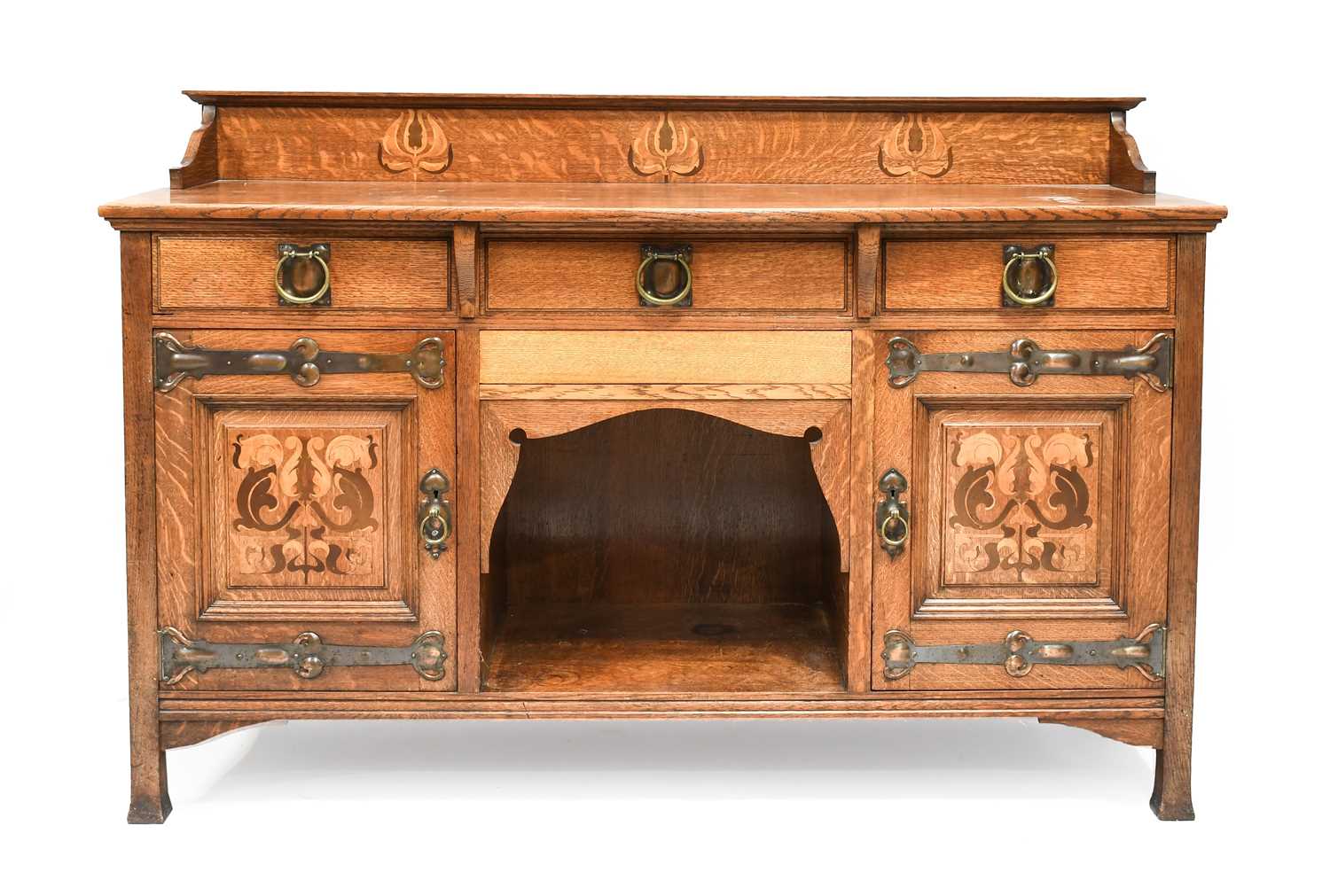 An Arts & Crafts Shapland & Petter of Barnstaple Inlaid Oak Sideboard, with raised upstand, above