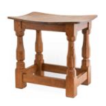 Workshop of Robert Mouseman Thompson (Kilburn): An English Oak Dish Top Stool, 1970s, the