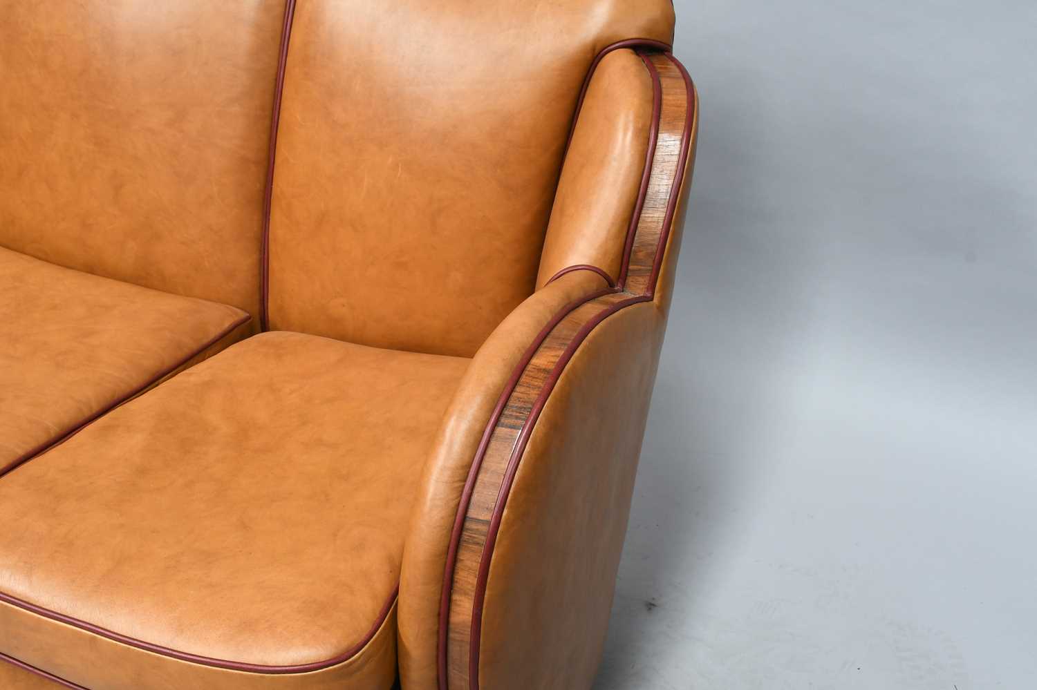 An Art Deco Cloud Three Piece Suite, re-upholstered in tan leather, trimmed in walnut, with cognac - Image 5 of 26