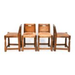 Robert Mouseman Thompson (1876-1955): A Set of Four English Oak Low Panel Back Chairs, circa 1930s/
