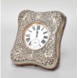 An Edward VII Silver Mounted Watch Case, by William Comyns & Sons, repousse with cherubs and