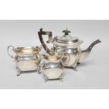 A Three-Piece Victorian Silver Tea-Service, by John Edward Wilmot, Birmingham, 1900, each piece