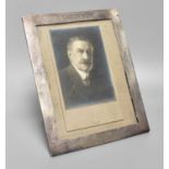 An Edward VII Silver Photograph-Frame, by William Comyns, London, 1905, oblong and with easel-