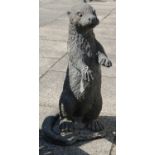 A Composition Garden Statue of Standing Otter, 60cm high