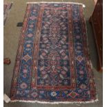 Hamaden Rug, the midnight blue Herati field enclosed by borders of meandering vine, 180cm by