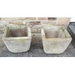 A Pair of Weathered Stone Square Form Planters,43cm by 43cm by 37cmWith drain holes. Each planter