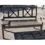 A Wooden Slatted Garden Bench by Pagoda