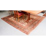 Amritsar Carpet, the ivory field of flower heads and vines enclosed by charcoal borders, 264cm by