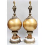 A Large Pair of Table Lamps, gilt metal and marble and with spherical glass pedestals, 73cm
