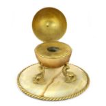 A George Betjemann & Sons Gilt Metal and Onyx Inkstand, circa 1900, of spherical form, the hinged