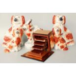 Five 19th century Staffordshire Models of Spaniels, one from the Royal Children pair, together