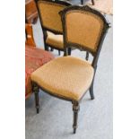 Four 19th Century Ebonised Dining Chairs, with parcel-gilt decoration