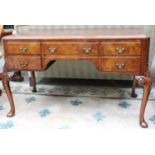 An Edwards & Roberts Walnut Desk, 126cm by 64cm by 73cm