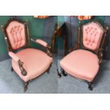 A Victorian Carved Mahogany Framed Gents Open Armchair, with a matching ladies example