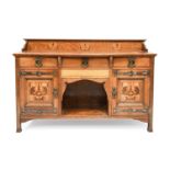 An Arts & Crafts Shapland & Petter of Barnstaple Inlaid Oak Sideboard, with raised upstand, above