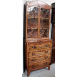 A George III Mahogany Secretaire Bookcase, decorated with inlay and cross-banding and with a