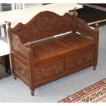 A Modern Carved Low Back Boxed Settle, 98cm by 48cm by 75cm