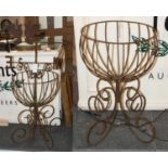 A Wrought Iron Weather Vane, 113cm high, and two wirework planters, 63cm high (3)