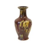 A Chinese "Shiwan" Flambé-Glazed Vase, Qing Dynasty, 18th/19th century, of baluster form with