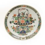 A Chinese Porcelain Dish, Kangxi, of circular form, painted in famille verte enamels with a basket