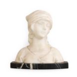 French School (circa 1900): A White Marble Bust of a Girl, wearing a headscarf, on a variegated