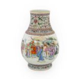 A Chinese Porcelain Vase, Qianlong reign mark but not of the period, of pear form, painted with