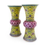 A Pair of Chinese Porcelain Beaker Vases (Gu), Jiaqing reign marks, with central lotus leaf knops,