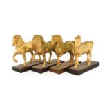 After the Antique: A Set of Four Gilt Bronze Models of the Horses of St Mark's Basilica, each
