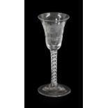 A Jacobite Wine Glass, circa 1750, the bell-shaped bowl engraved with a rose and buds, the reverse