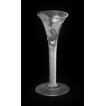 A Jacobite Wine Glass, circa 1750, the drawn trumpet bowl engraved with a rose sprays, oak leaf