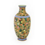 A Chinese Porcelain Vase, Qianlong reign mark, of baluster form with flared neck, painted with