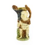 A Wood-Type Pearlware Bacchus Toby Jug, circa 1800, modelled seated holding a cornucopia with