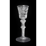 A Jacobite Wine Glass, circa 1750, the bucket-shaped bowl engraved with a rose spray and inscribed