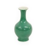 A Chinese Green-Glazed Porcelain Vase, Qing Dynasty, of baluster form with flared neck12.5cm