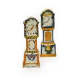 ^ A Prattware Model of a Longcase Clock, circa 1810, with foliate cresting over two putti flying