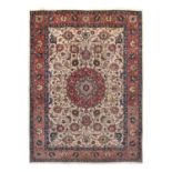 Tabriz CarpetNorth West Iran, circa 1930The ivory field of palmettes and vines centred by a