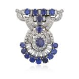 A Sapphire and Diamond Brooch/Pendantthe articulated scroll motif set throughout with oval cut