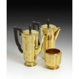 A Three-Piece George VI Gold Cafe-au-Lait Service, by E. Silver and Co., Sheffield, 1947, 18ct