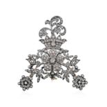 A Diamond Broochthe central flower head surrounded by leaf motifs, terminating to smaller flower