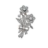 A Victorian Diamond Broochrealistically modelled as ribbon tied flowers, set throughout with old