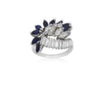 A Sapphire and Diamond Cluster Ringa row of baguette cut diamonds terminates to a spray motif